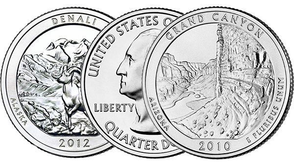 Three America the Beautiful Silver coins, with the reverse sides showing Denali national park and the Grand Canyon.