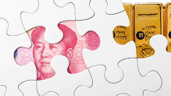 Image: A puzzle board with the two pieces removed, revealing a Chinese Yuan note and a stack of gold.